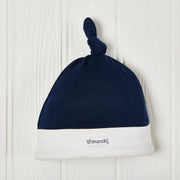 navy baby boy knotted hat with cream trim