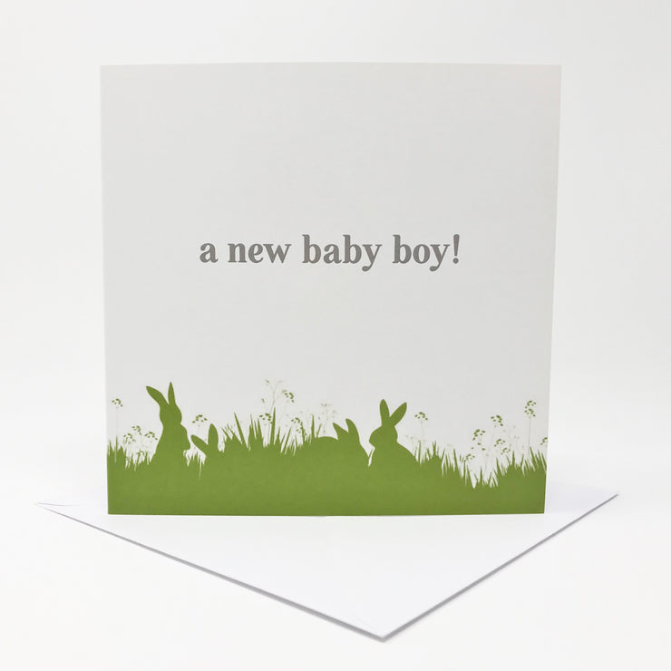 a new baby boy card with green bunny illustration at the base