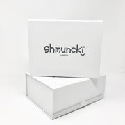 shmuncki white gift boxes