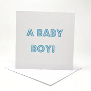 a baby boy new arrival card in blue