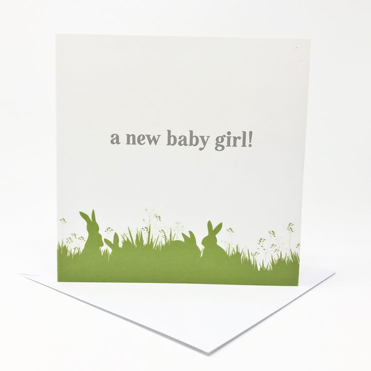 new baby girl card with green bunny illustration at the bottom